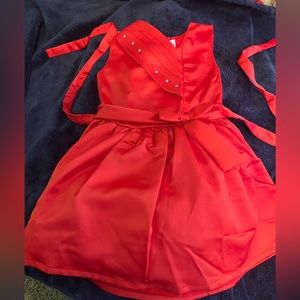 This adorable toddler dress sleeveless frock with vibrant red color and size 22.